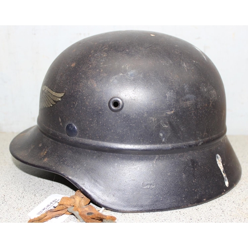 1476 - A WW2 period German Luftschutz (Civil Air Defence) helmet with decal, believed to be an M35 with par... 