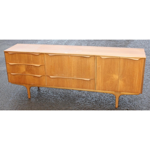 2 - A retro mid-century S-Form teak sideboard by Sutcliffe of Todmorden, 3 drawers to the left, dropdown... 