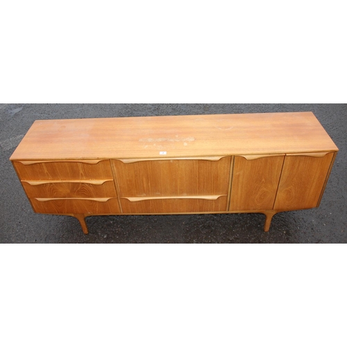 2 - A retro mid-century S-Form teak sideboard by Sutcliffe of Todmorden, 3 drawers to the left, dropdown... 