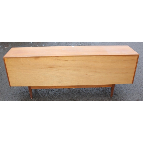 2 - A retro mid-century S-Form teak sideboard by Sutcliffe of Todmorden, 3 drawers to the left, dropdown... 