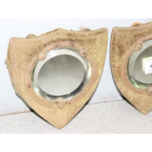 453 - Pair of bevelled edge round mirrors on shield shaped backings, approx 18cm tall