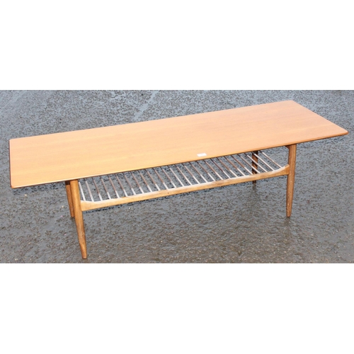 5 - A retro mid-century G-Plan coffee table of large size with magazine rack, approx 159cm wide x 58cm d... 