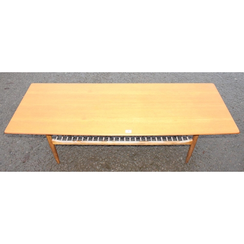 5 - A retro mid-century G-Plan coffee table of large size with magazine rack, approx 159cm wide x 58cm d... 