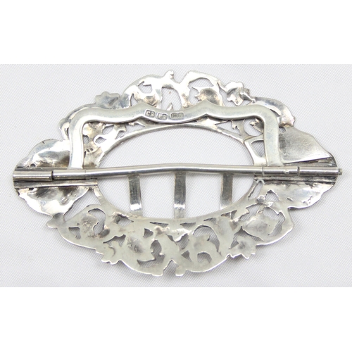 1029 - An antique silver belt buckle with cast Green Man decoration, Chester 1891 by Shepherd & Saunders, a... 