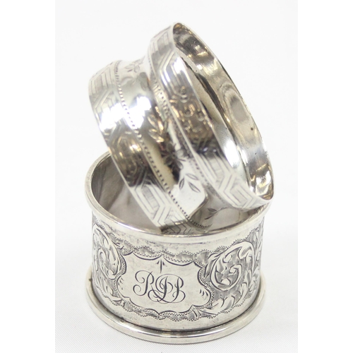 1032 - 2 antique silver napkin rings and a silver pepper pot, various dates and makers, approx 74.15g gross