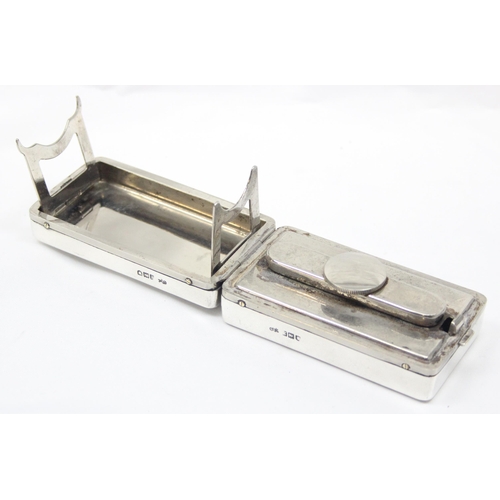 1044 - A set of silver cased curling iron spirit burner, London 1902 by G.H. James, approx 292.16g gross in... 