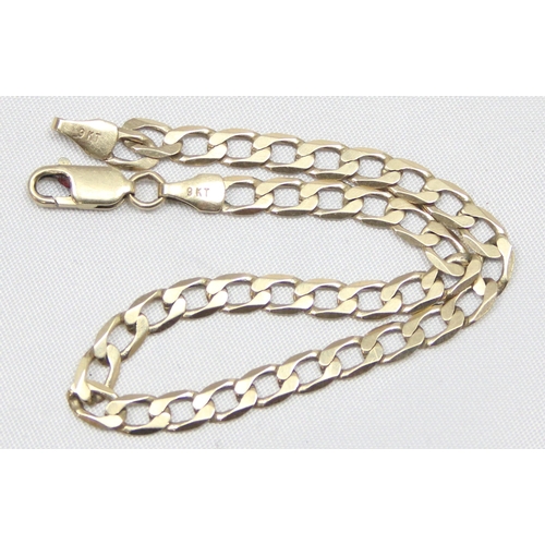 1109 - An Italian 9ct gold flat kerb chain bracelet, marked and XRF confirmed, approx 20cm long, approx 3.8... 