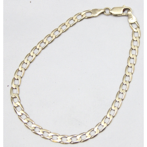 1109 - An Italian 9ct gold flat kerb chain bracelet, marked and XRF confirmed, approx 20cm long, approx 3.8... 