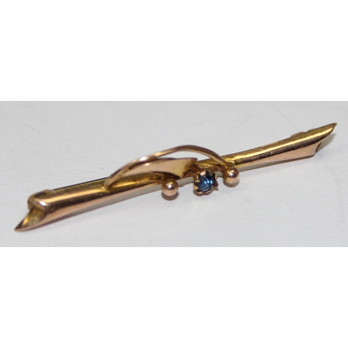 1113 - An early 20th century 9ct gold bar brooch set with sapphire, marked and XRF confirmed, approx 1.08g ... 