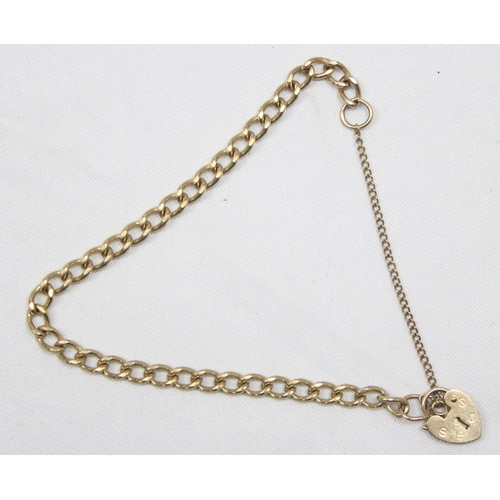 1135 - A 9ct gold bracelet with padlock clasp, marked 375 and XRF confirmed, approx 16cm long, approx 8.02g... 