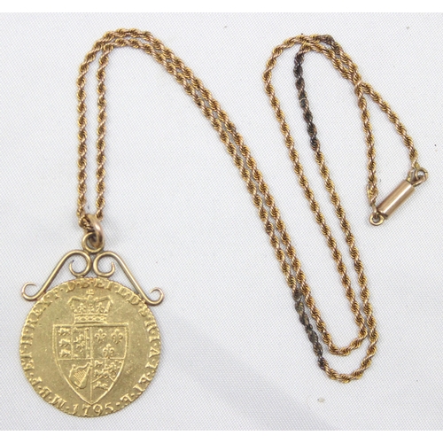 1208 - George III (1760-1820) 1795 Spade Guinea coin, with soldered scrollwork mount and 9ct gold chain, ap... 