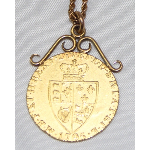 1208 - George III (1760-1820) 1795 Spade Guinea coin, with soldered scrollwork mount and 9ct gold chain, ap... 