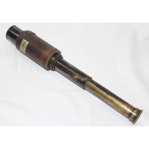 668 - A vintage 4 drawer brass and leather telescope with applied name plaque for W.E. Harvey, seemingly n... 