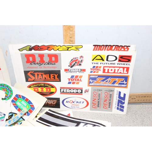 711 - Qty of vintage motoring/racing stickers and other ephemera