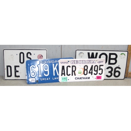 714 - 4 overseas vehicle tin registration plates