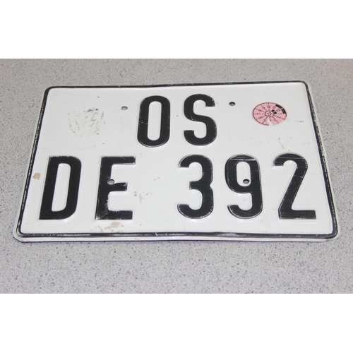 714 - 4 overseas vehicle tin registration plates