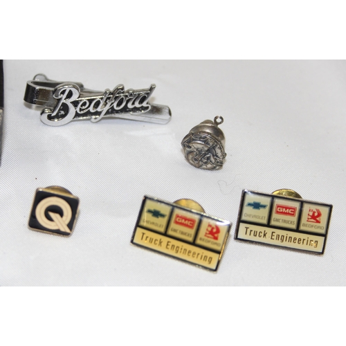 715 - Qty of assorted interesting vintage tie clips and badges, all motoring related