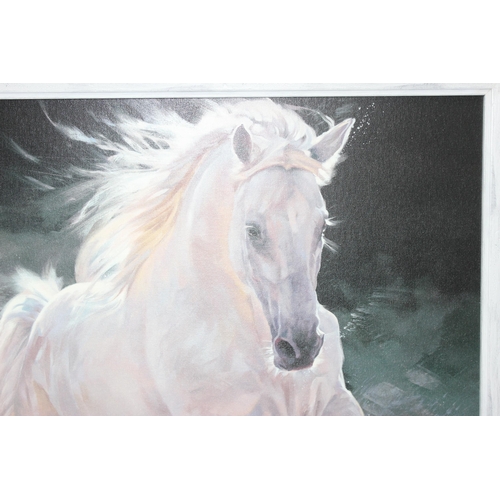 499L - Debbie Boon (British 1960 -) limited edition signed print of a galloping white stallion, signed in p... 