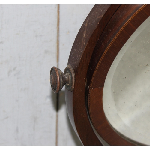 274 - An antique mahogany framed table top mirror, approx 50cm wide