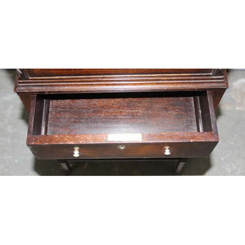 48 - A small antique mahogany pot cupboard of unusual form, approx 34cm wide x 24cm deep x 72cm tall