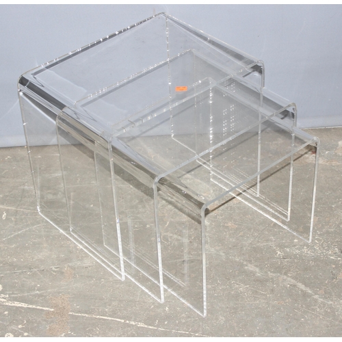 50 - A retro Perspex nest of tables, the largest approx 46cm wide x 33cm deep x 40cm tall