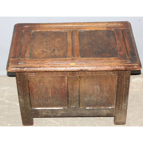 57 - A small antique style oak coffer, approx 60cm wide x 38cm deep x 40cm tall