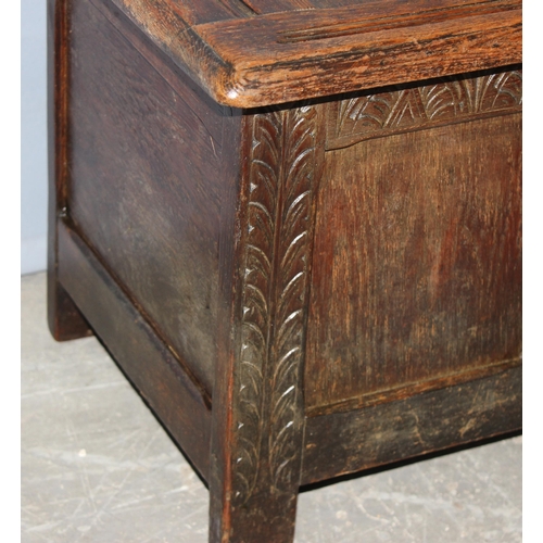 57 - A small antique style oak coffer, approx 60cm wide x 38cm deep x 40cm tall