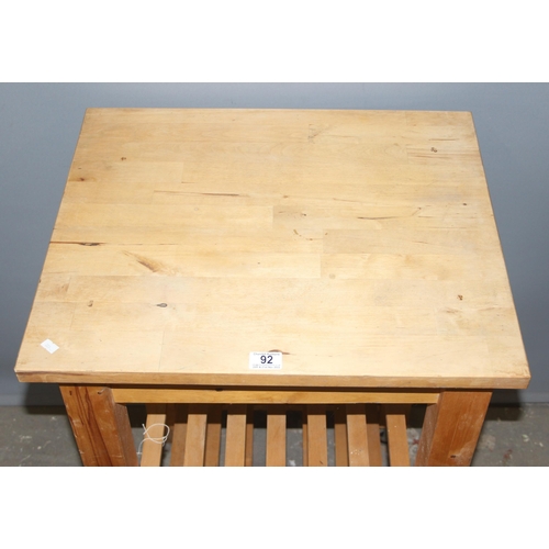 84 - Pine kitchen island or chopping table with wheels, approx 60cm wide x 50cm deep x 85cm tall