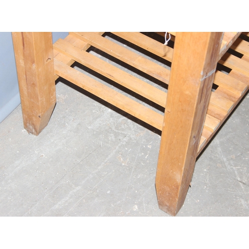 84 - Pine kitchen island or chopping table with wheels, approx 60cm wide x 50cm deep x 85cm tall