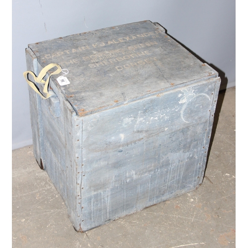 94 - A distressed painted wooden trunk with military writings, approx 60cm wide x 50cm deep x 52cm tall