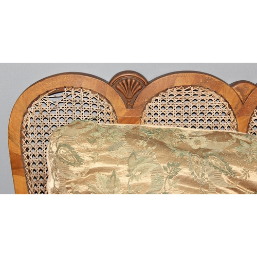 107 - An Art Deco period 3 seater bergere backed sofa with carved walnut frame, approx 164cm wide x 80cm d... 