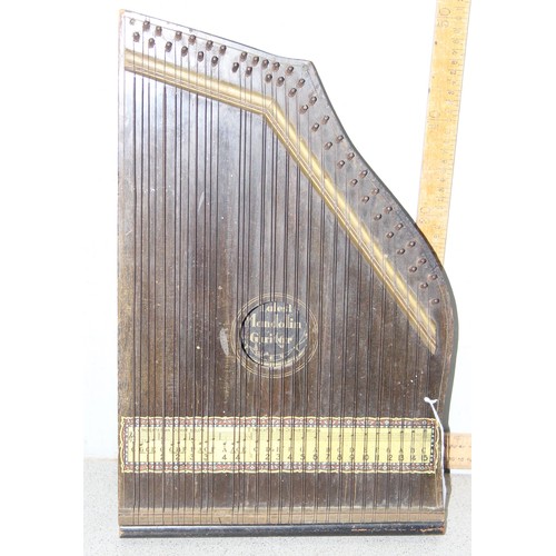 605 - An antique zither harp