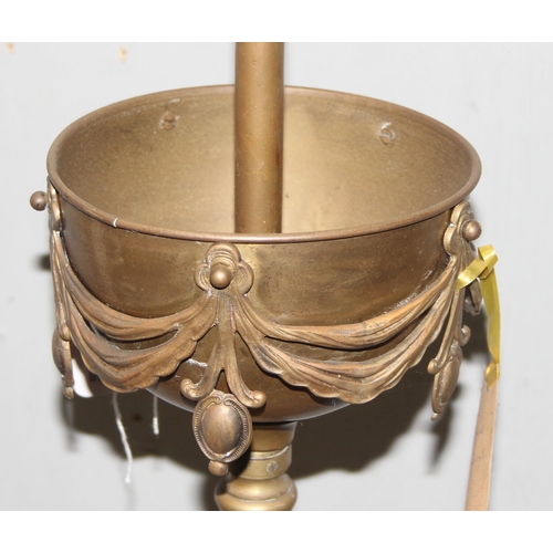 256A - Antique brass standard lamp with onyx dumbwaiter, 3 footed Corinthian style oil lamp later converted... 