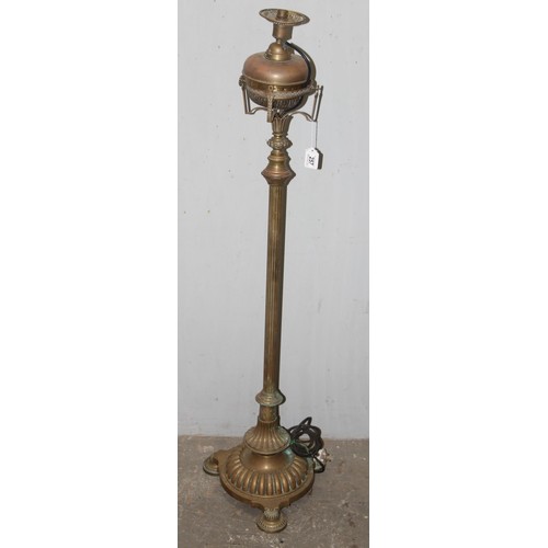 256A - Antique brass standard lamp with onyx dumbwaiter, 3 footed Corinthian style oil lamp later converted... 