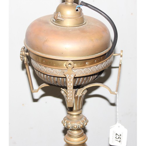 256A - Antique brass standard lamp with onyx dumbwaiter, 3 footed Corinthian style oil lamp later converted... 