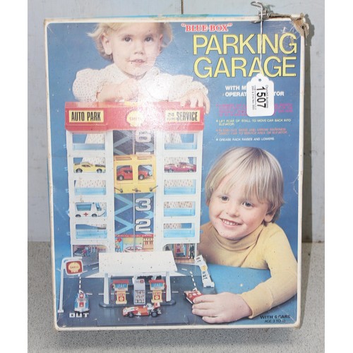 1506A - Qty of vintage toys and games to incl 1970's Blue Box Shell Parking Garage in original box