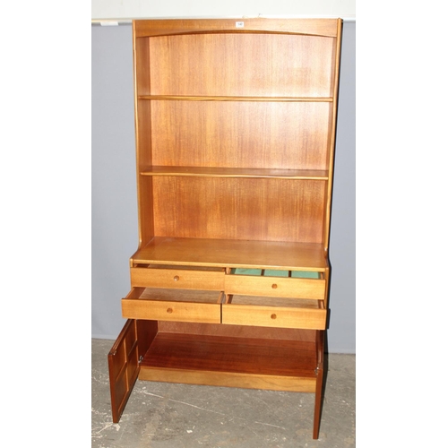 140 - A retro Nathan wall display unit with 4 drawers over 2 cupboards, 1 of 3 pieces that could fit toget... 