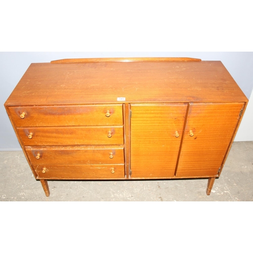 143 - A retro mid-century sideboard by Minty of Oxford, a bank of 4 drawers and a 2 door cupboard, approx ... 