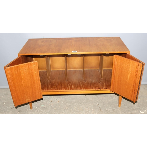 144 - A retro mid-century record cabinet with bi-fold doors, approx 93cm wide x 39cm deep x 62cm tall