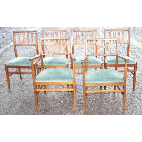 147 - A retro mid-century extending dining table and 6 chairs (4+2), seemingly unmarked, the table approx ... 