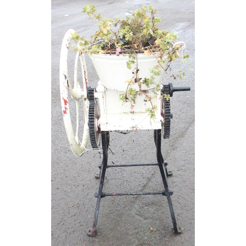 302 - A vintage cast iron Bentall grinder or mangle base with later added planter, white and black painted... 