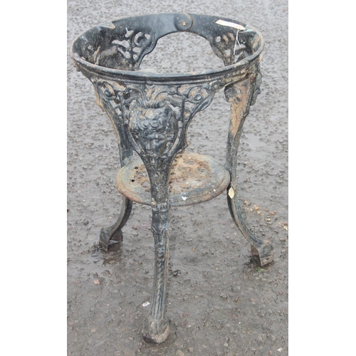 304 - A vintage cast iron pub table base, approx 46cm wide x 68cm tall