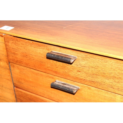 8 - A retro mid-century Meredew sideboard, a bank of 4 drawers flanked by 3 cupboards, approx 206cm wide... 