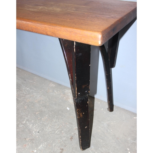 80 - A vintage pub or tavern table with unusual legs, approx 122cm wide x 45cm deep x 71cm tall