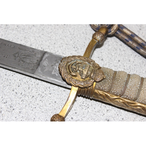 1481 - An Early 20th Century Royal Navy Dirk or short sword by Gieves, the piece named 