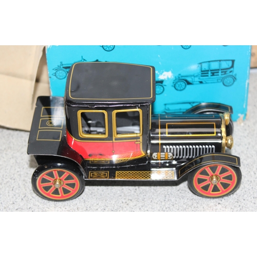 1543 - Ichimura Co Japanese vintage tinplate friction propelled model T Ford in original box and a Japanese... 