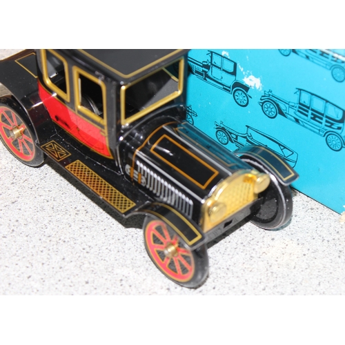 1543 - Ichimura Co Japanese vintage tinplate friction propelled model T Ford in original box and a Japanese... 