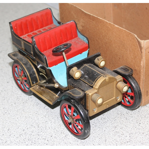 1543 - Ichimura Co Japanese vintage tinplate friction propelled model T Ford in original box and a Japanese... 