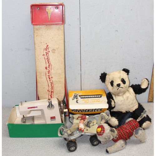 1548 - Child's vintage battery powered dog, ironing board, roller-skates and sewing machine