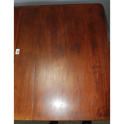 160 - An antique mahogany dropleaf table on turned legs, approx 113cm wide x 84cm deep x 73cm tall